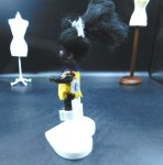 small black hp doll yellow side